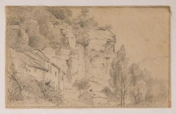 Häuser unter Kalksteinfelsen